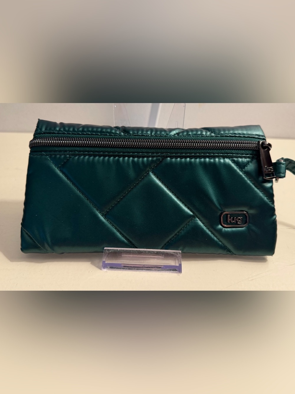 Lug Sway Pouch is featured in the Metallic Wickedly Green finish.